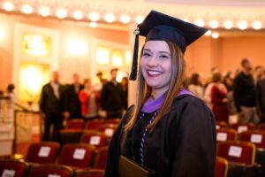 Jenna Schardt smiles during commencement