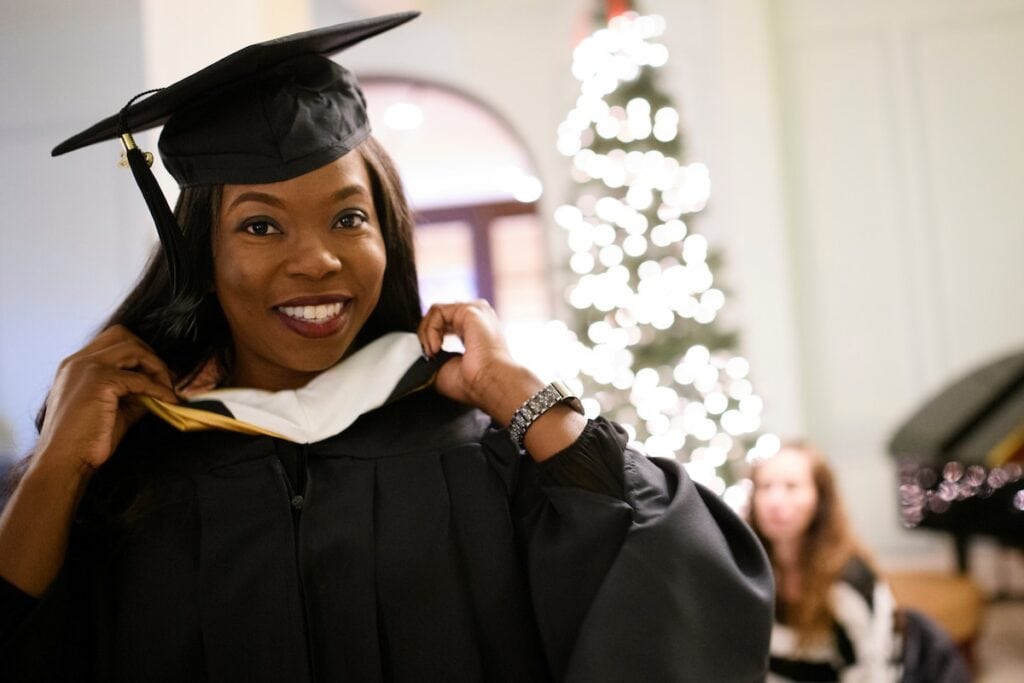 Student showing off her stole