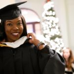 Student showing off her stole