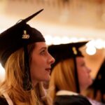 Student paying attention to the ceremony