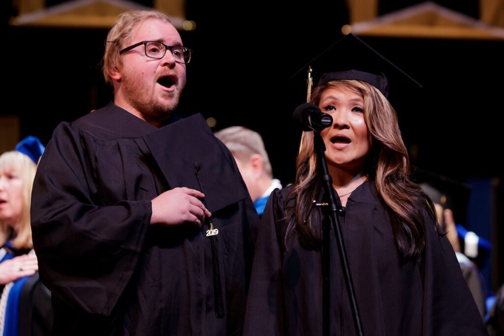 student singing on stage