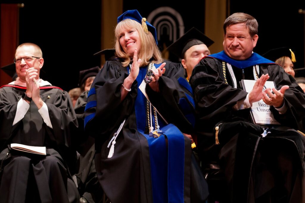 Dr. Dobkins clapping