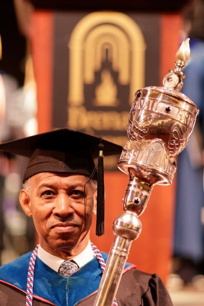 Joe Green carries the mace during the Brenau University Undergraduate Commencement ceremony on Friday, Dec. 14, 2018 in Gainesville, Ga. (AJ Reynolds/Brenau University)