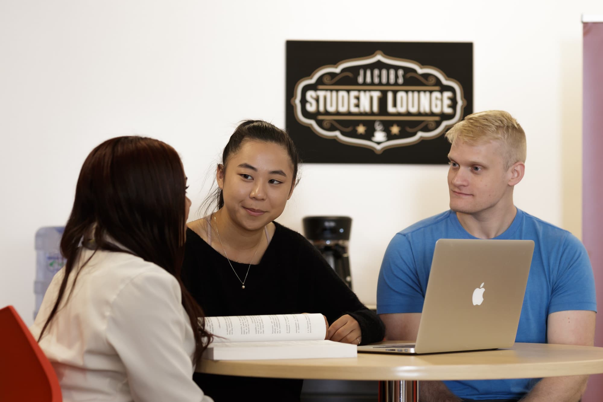 Students study in the Jacobs building lobby