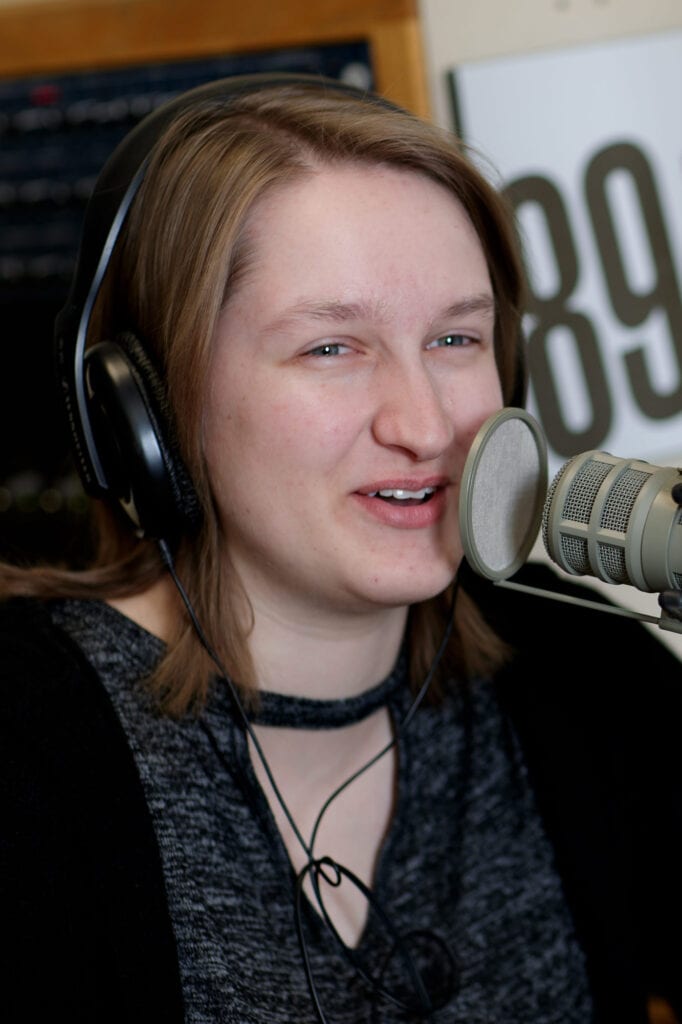 A student on-air in Brenau's WBCX radio station