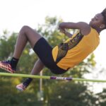 An athlete participates in the high jump.