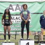 The podium with two Brenau athletes taking first and second place.