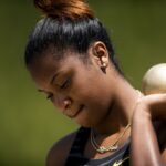 An athlete preparing for shot put.