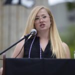 A student speaks at the ceremony.