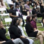 Students sit at the pinning ceremony.