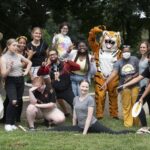 Students pose with Brenau's mascot HJ.