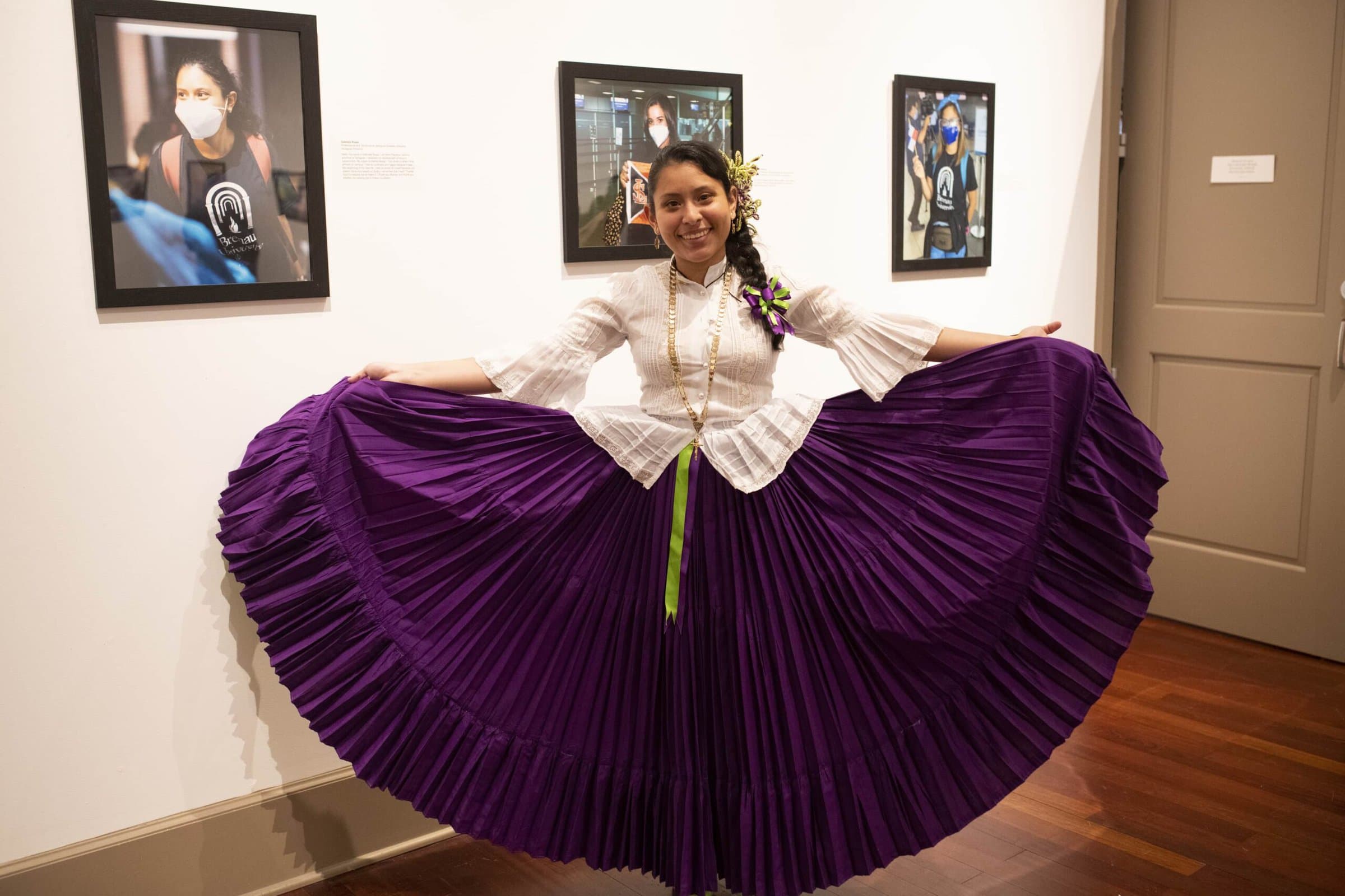 Panamanian Student in traditional dress at art gallery