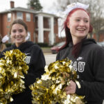 Brenau cheerleaders support the runners in the 2022 Dempsey Dash