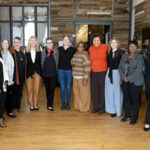 Brenau President Skleder and Executive Women's MBA cohort pose for photo