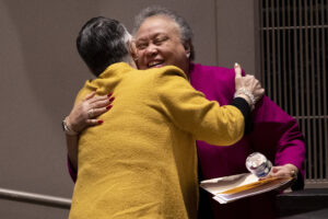President Skleder hugs Belle Wheelan
