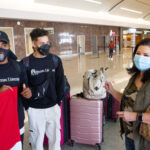 Panamanian students talking in the airport