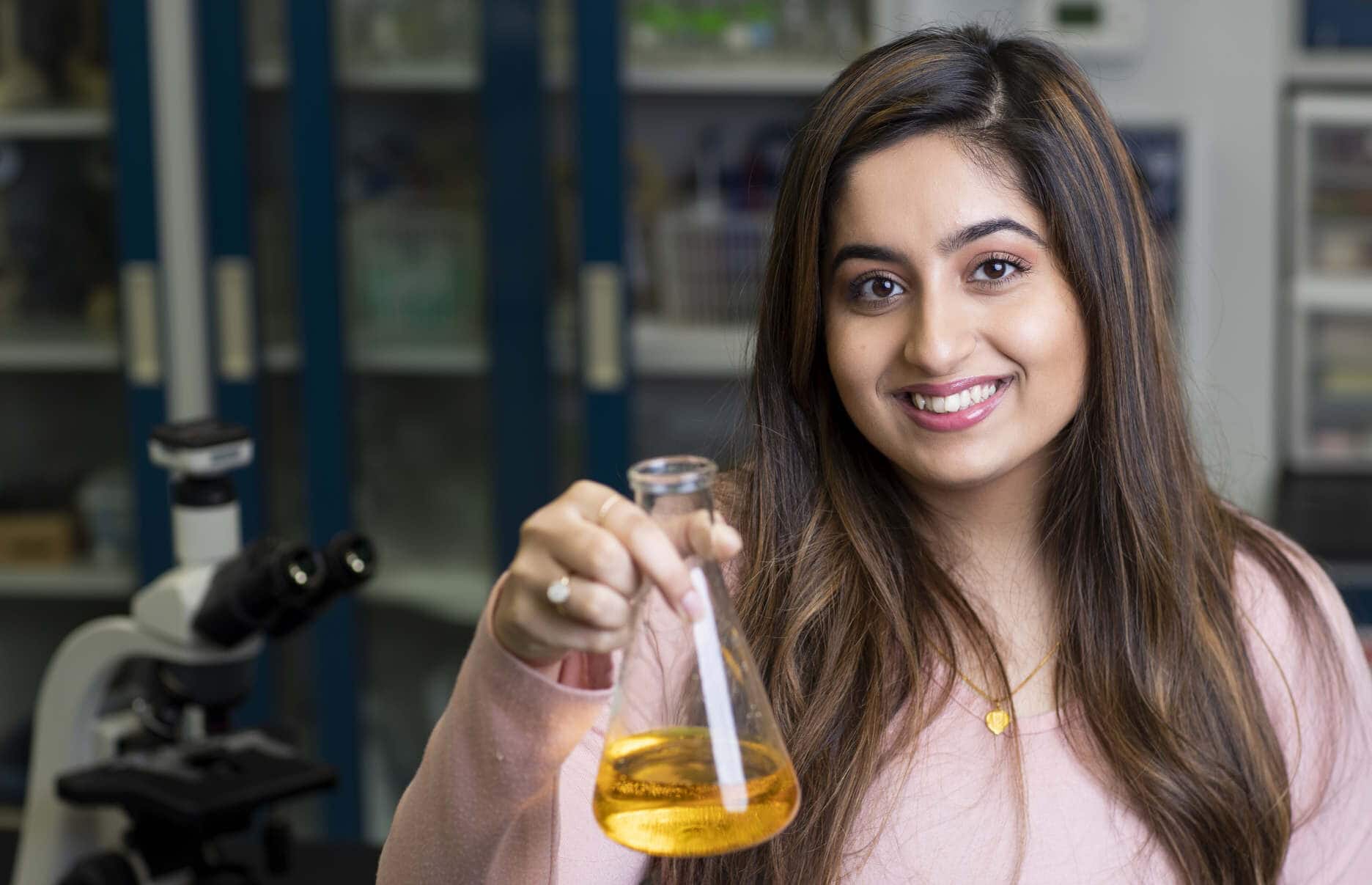 A biology student in a lab