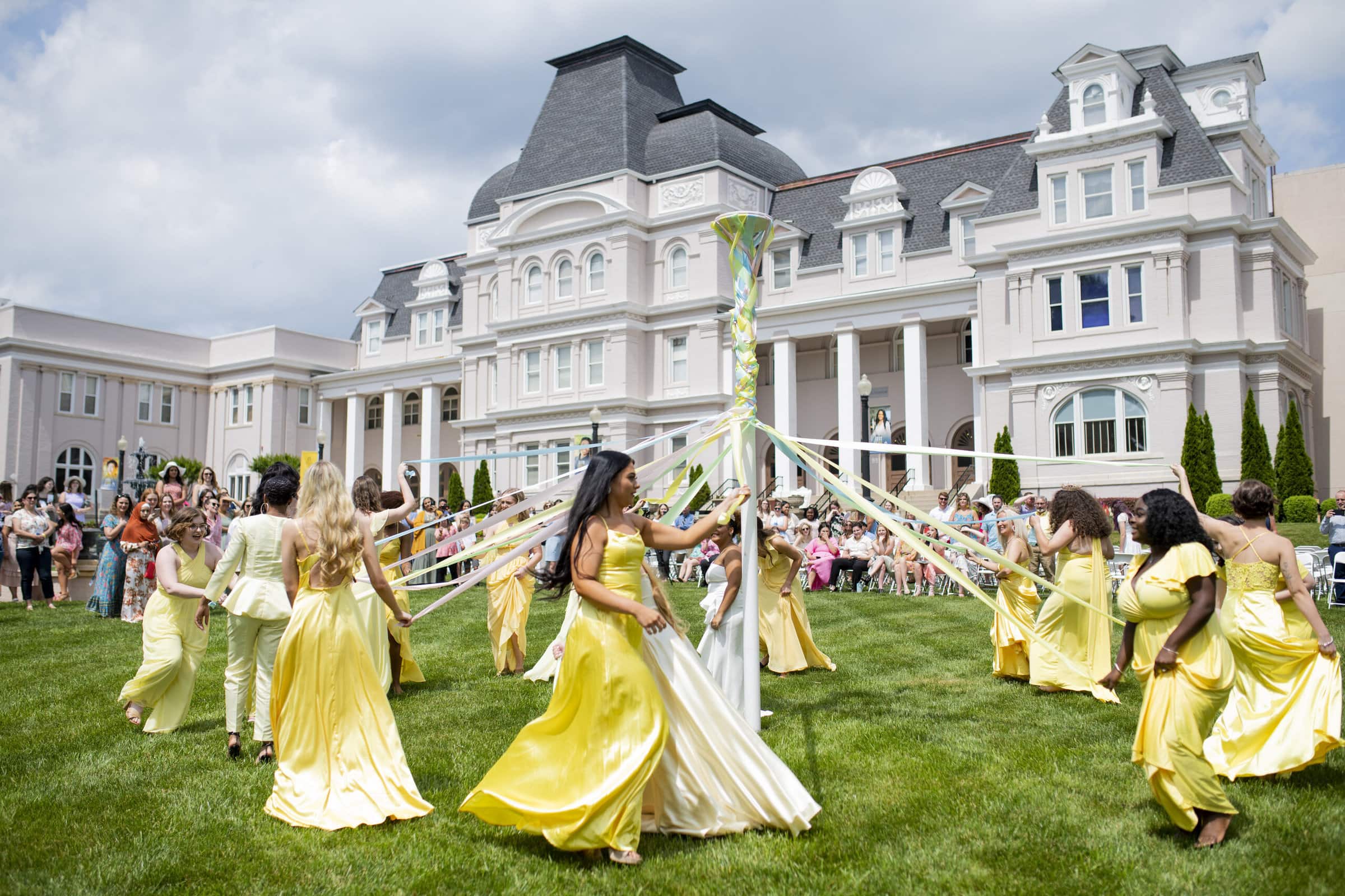 Students wrap the May Pole at Alumni Reunion Weekend 2022