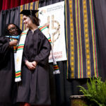 Student getting a kente stole