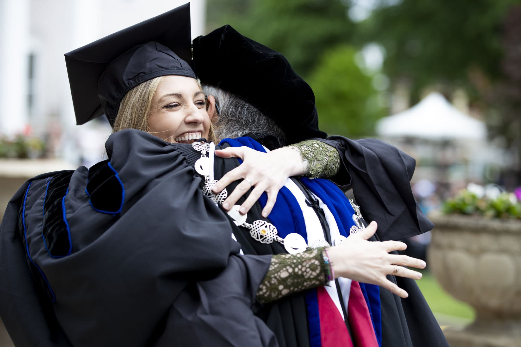 Josie Rabbitt hugs Brenau President Anne Skelder at graduation