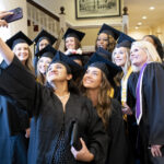 University graduates take a selfie