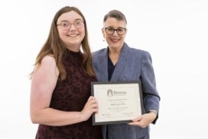 Abigail Wilks and Anne Skleder with Abigail's certificate.