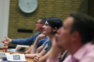 People listening to the roundtable discussion at Oxford University.