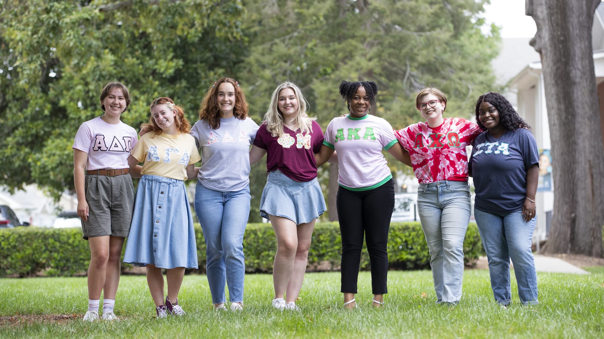 Sorority members pose for a photo on Brenau's front lawn