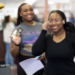 New students check in in the library.