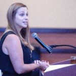 Hannah Boudreaux Vollenweider, member of the Brenau swimming and diving team 2010-2013, speaks at the Brenau University Athletics Hall of Fame Awards on Sept. 29, 2018.