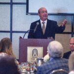 Former head tennis coach and 2015 hall of fame inductee Dr. Bill Rogers speaks at the Brenau University Athletics Hall of Fame Awards on Sept. 29, 2018.