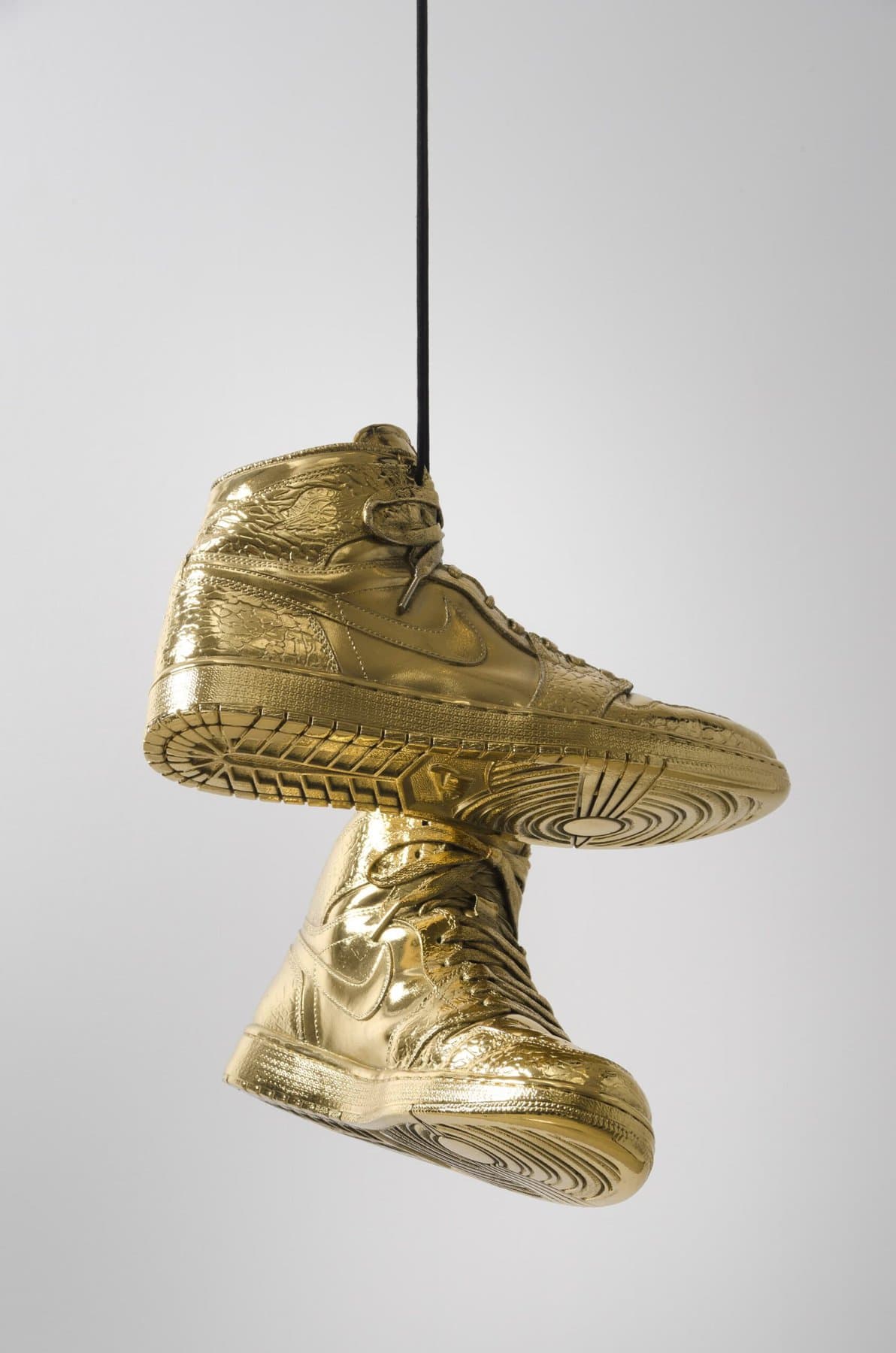 Kendell Carter, "Effigy for a New Normalcy VI (Accepting Greatness), gold-plated sneakers, 2017