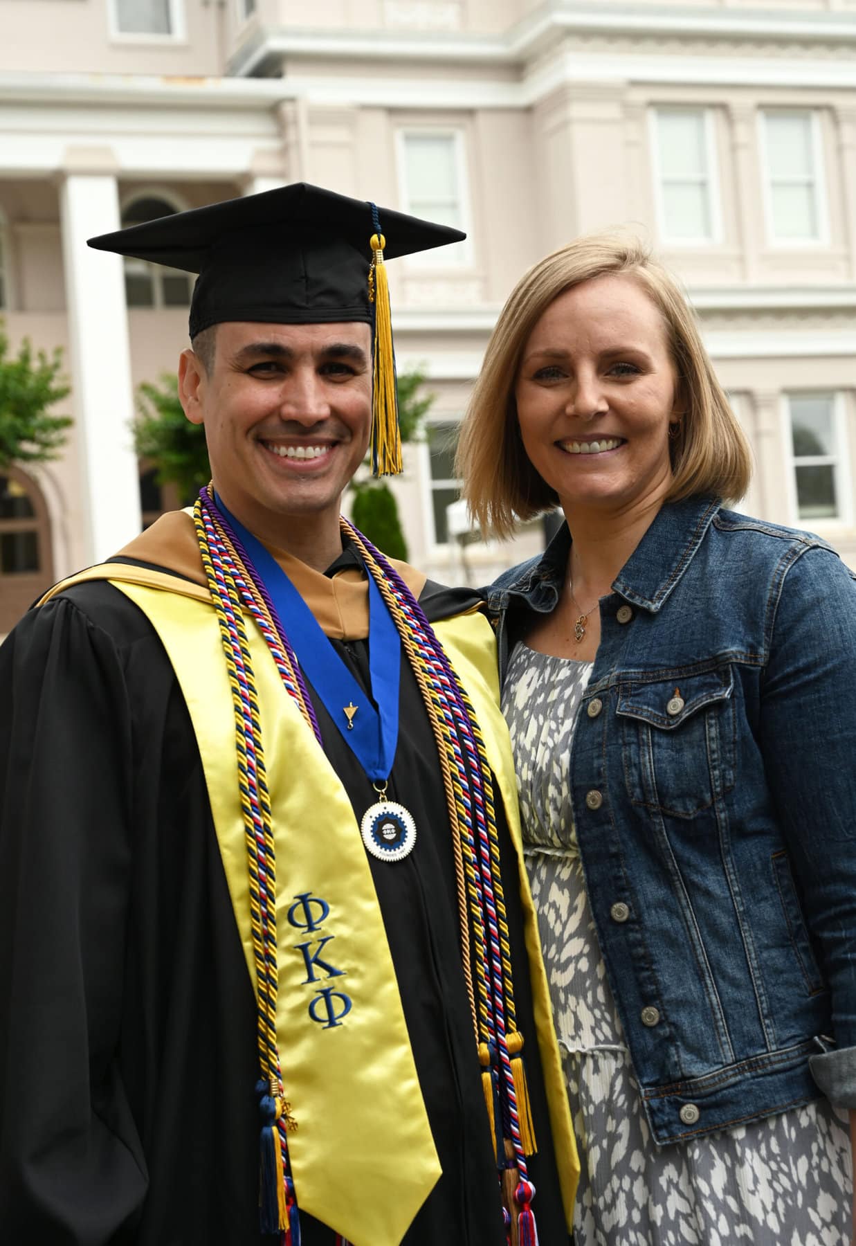 Gil Rodriguez and his wife after the university graduation