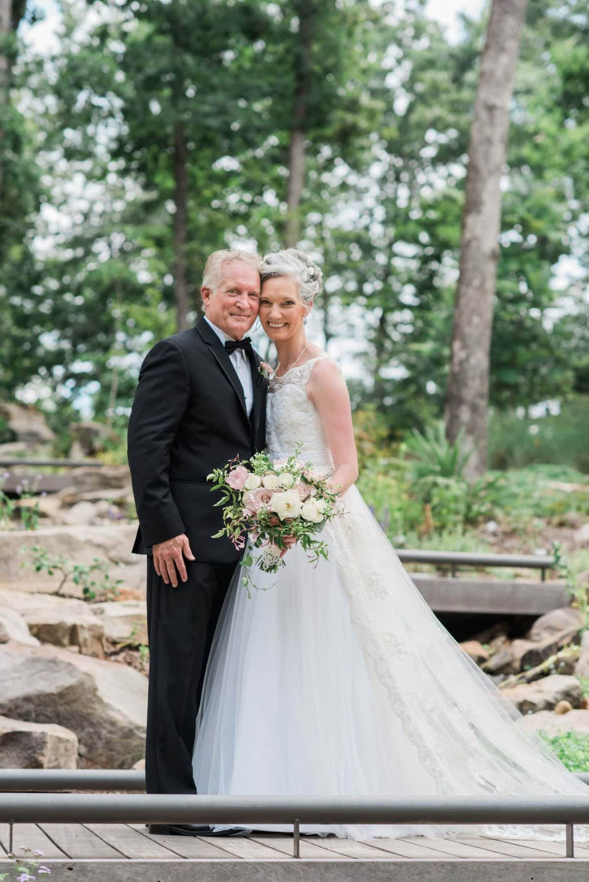 Dennis Carlton and Jolie Long Carlton in wedding attire.