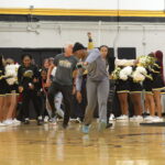 Athletes share in the excitement at the pep rally.