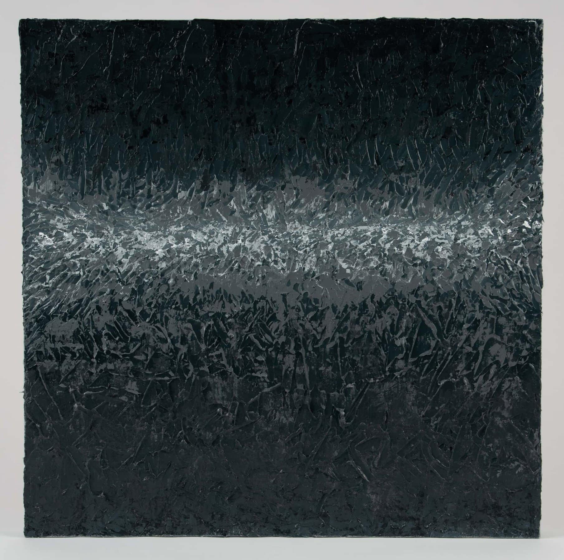 This painting has an impasto texture. The color begins with a black and transitions to grey and light grey in the center. The bottom transitions from dark grey to black.