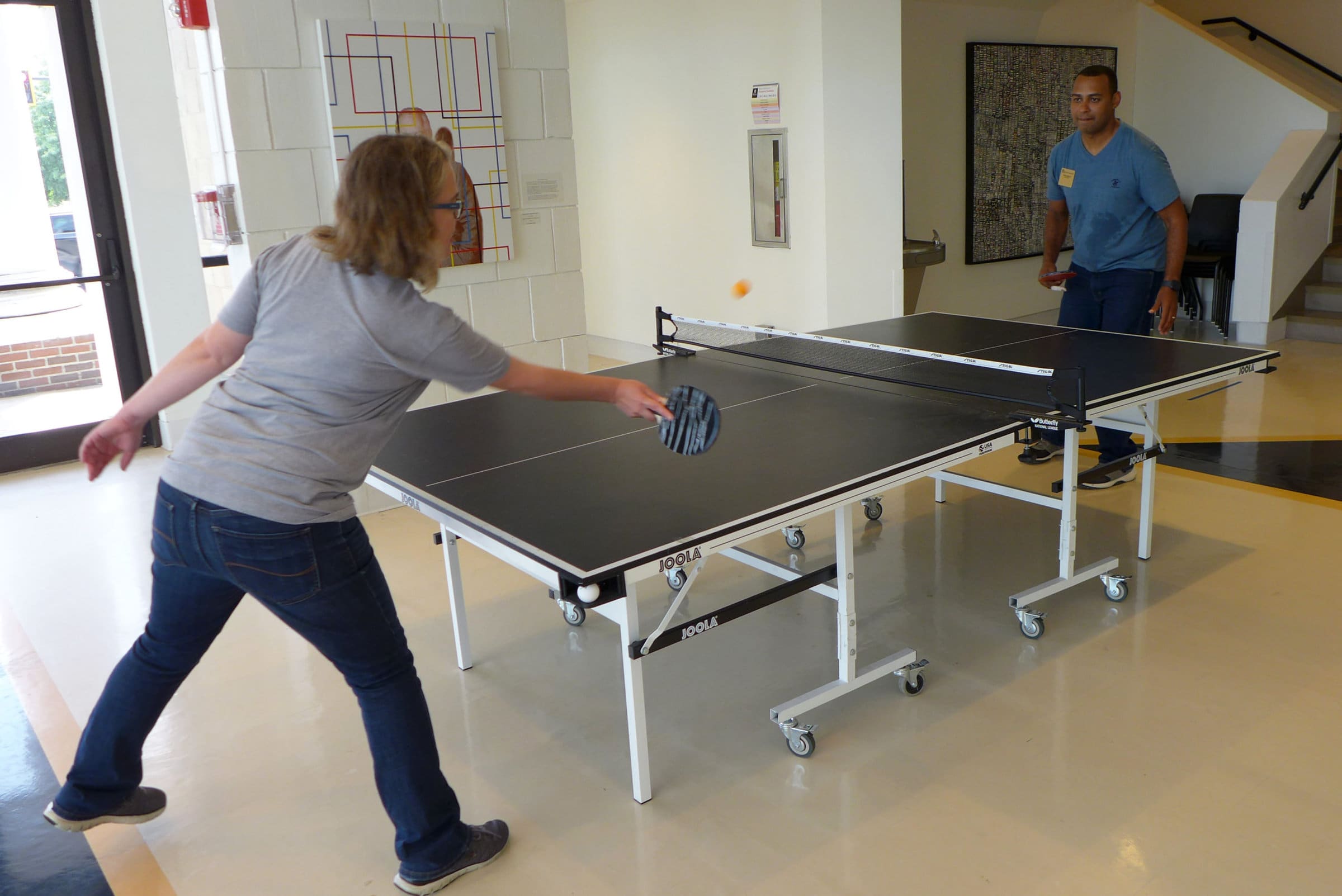 people playing ping-pong