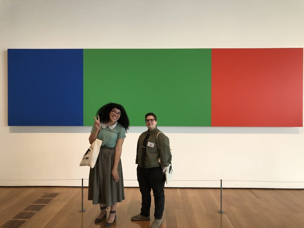In this picture Jennifer is seen standing in the lobby of the High Museum with one of the other Fellows.
