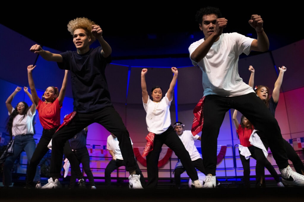 Two Panamanian students dance center stage during Panamanian Cultural Day.