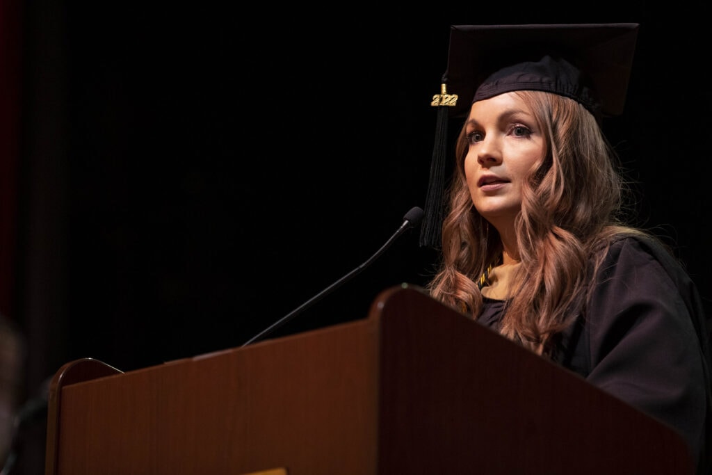 Brooke Pattillo speaks at the podium during winter commencement.