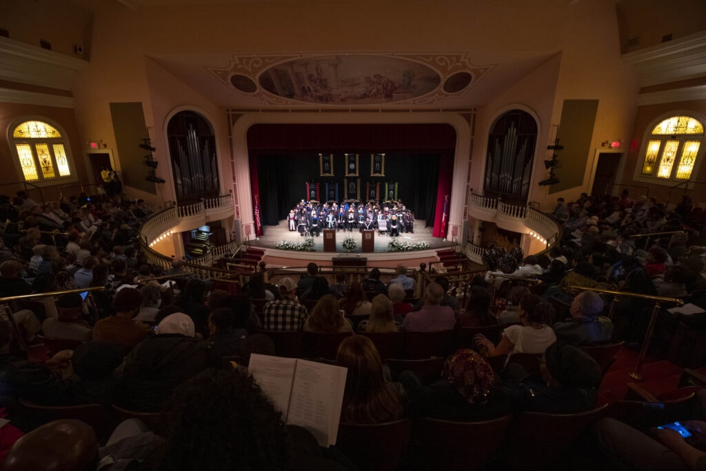 A view of the stage and audience during winter commencement.