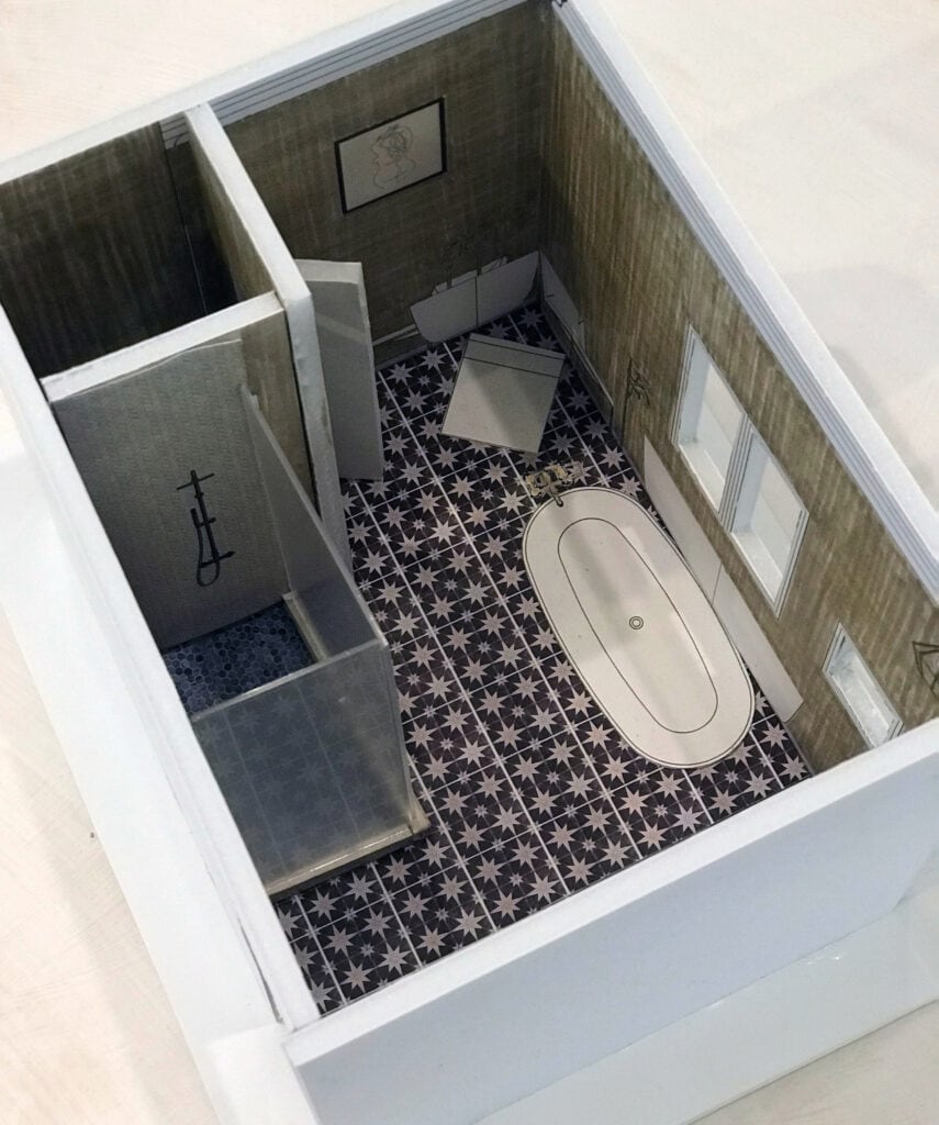 A three-dimensional model depicts a master bathroom design