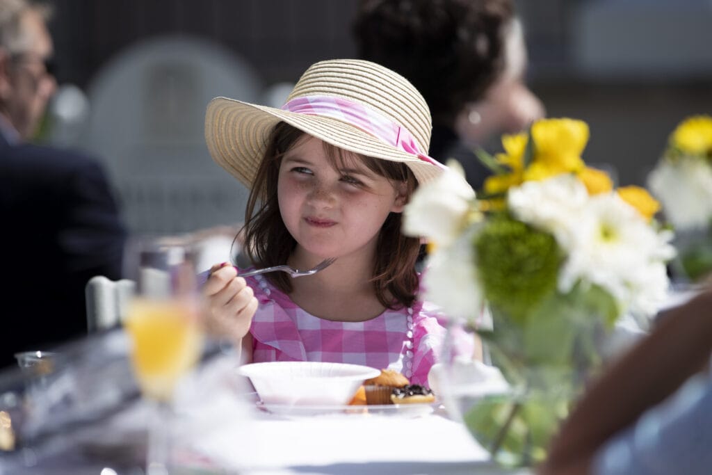 girl in spring dress and hat 