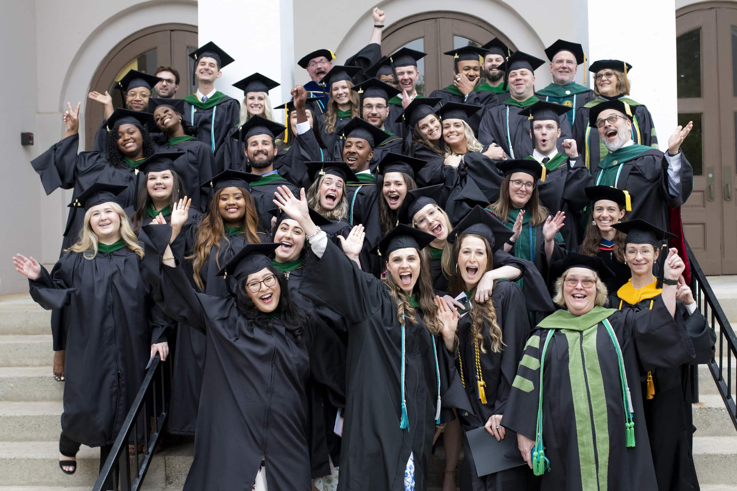The inaugural cohort of Physician Assistant Studies graduates after commencement on Saturday, May 6.