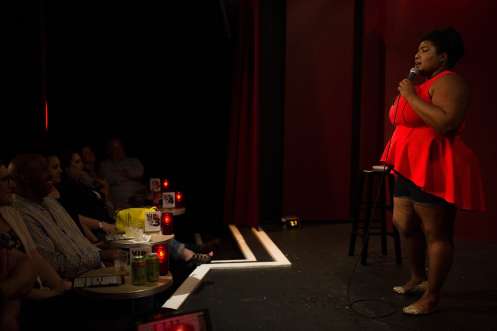 Dulce Sloan performing on stage at the Laughing Skull