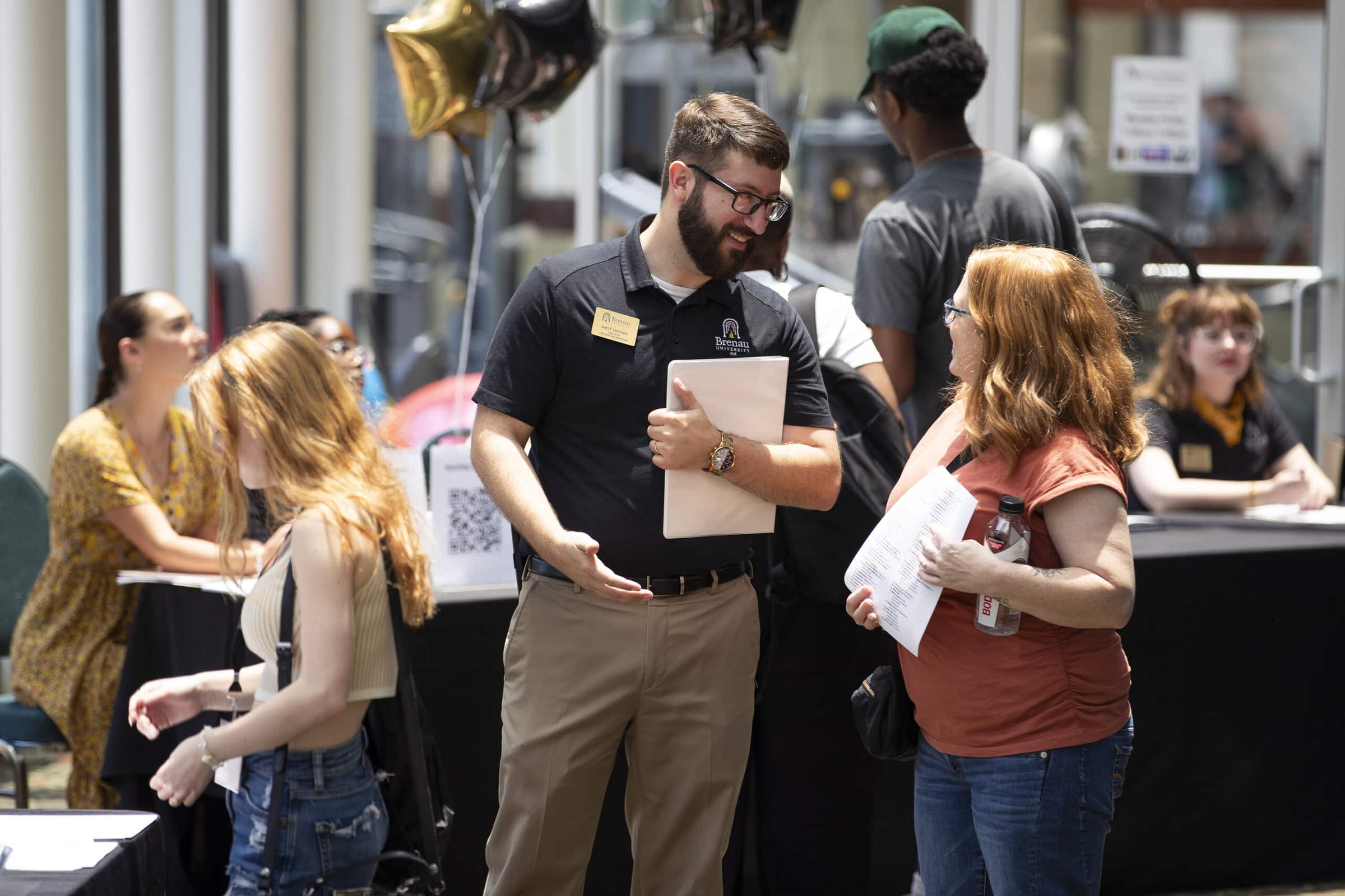 Admissions Director answering questions