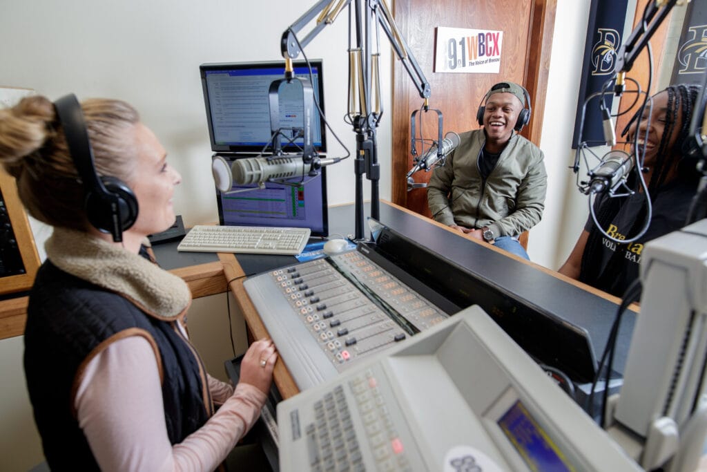 Students experiment in the WBCX studio in 2019.