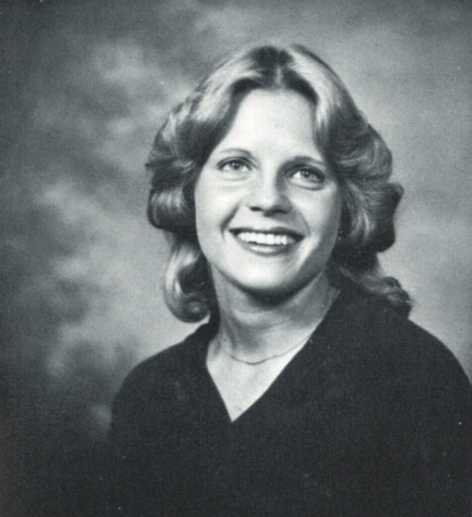 A black and white yearbook photo of Gigi Andrews