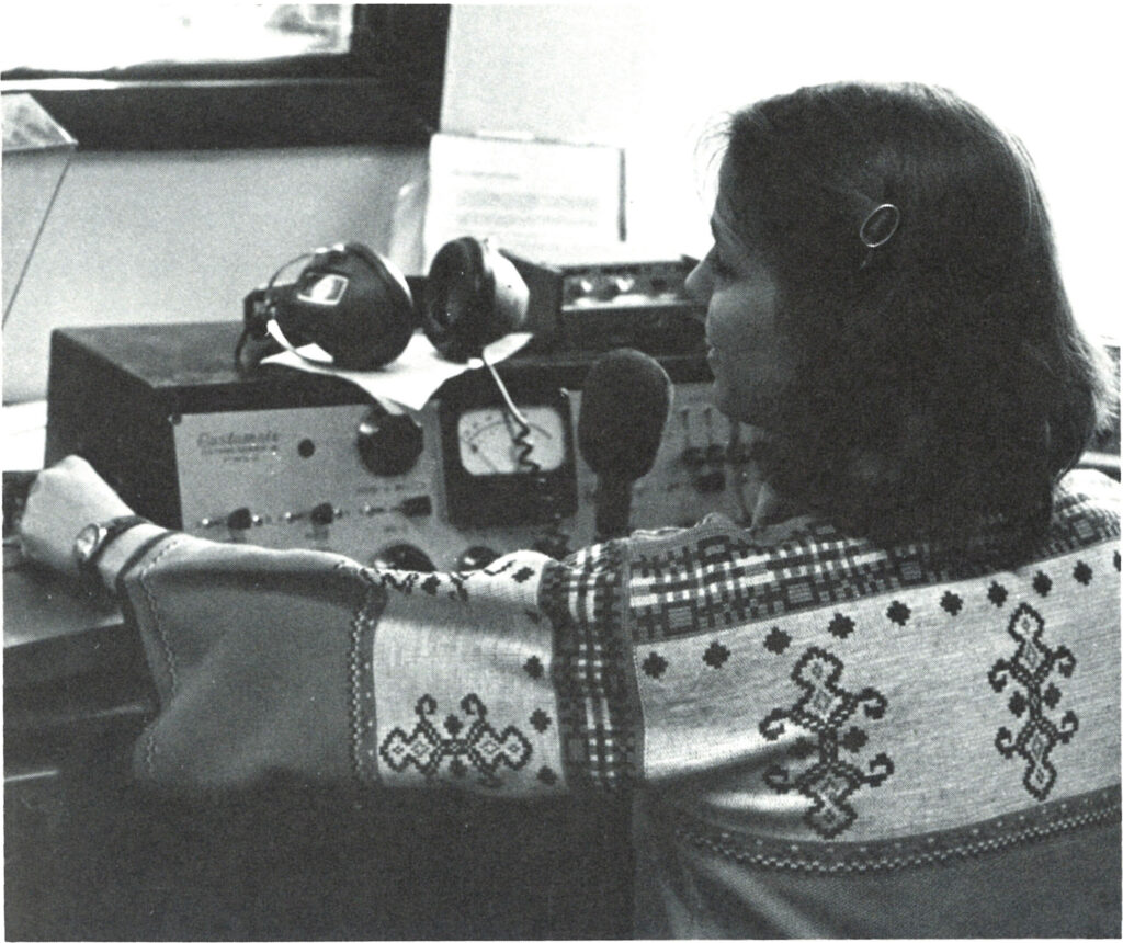 A female student adjusts the sound at WBCX in the mid-1980s