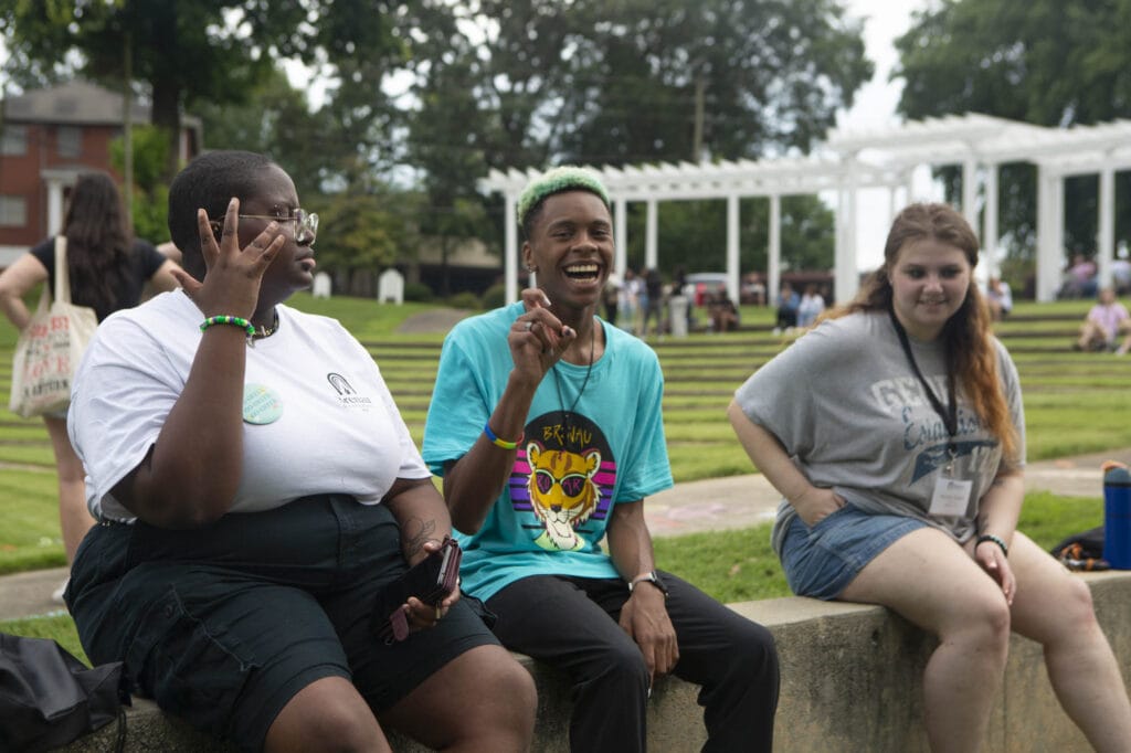Students laughing and chatting while at camp brenau